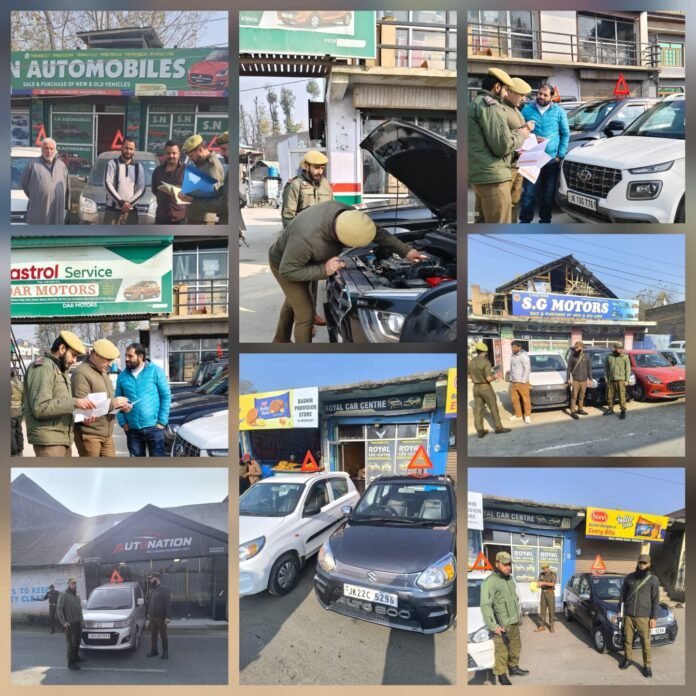 Awantipora police inspecting vehicle records at dealership